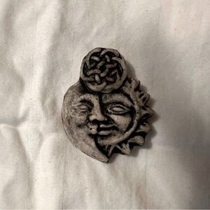 Crescent moon with sun and Celtic knot